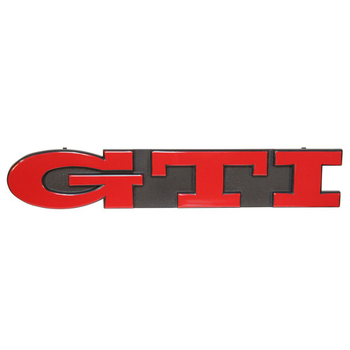 Front grille badge - front,