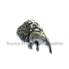 ONE PEWTER BADGE FOR WALKING STICK MAKING SPANIEL WITH PHESANT IN MOUTH