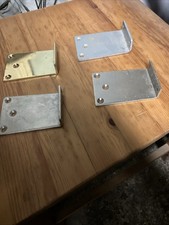 4 X Small Fixing Brackets 