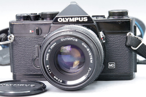 Olympus black 35mm slr - 35mm,