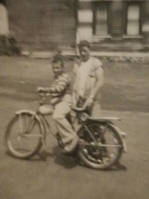 Boy on Motorcycle Bicycle