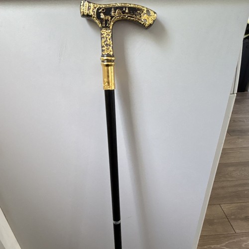 Metal carved walking cane with - carved,