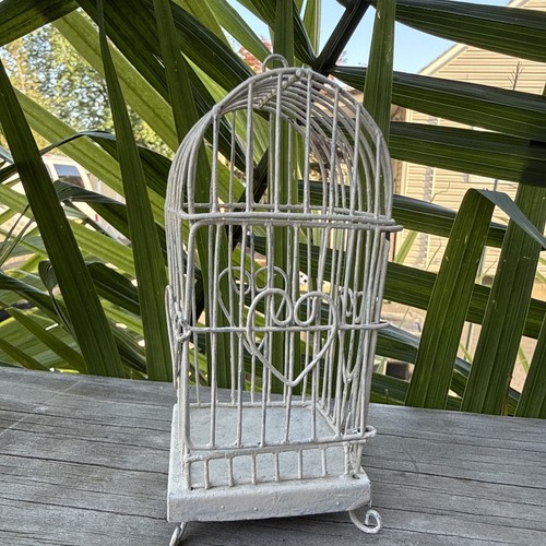 Small decorative white metal