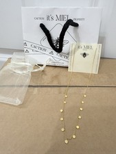 It’s MIEL Gold Tone Coin