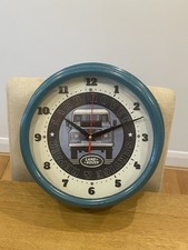 Blue Land Rover Clock In