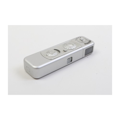Minox with - b,