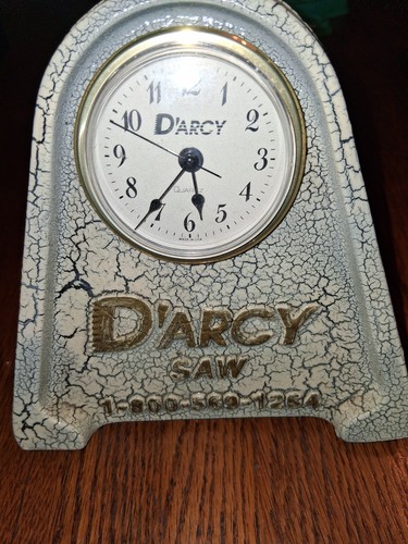 Arcy saws cast - iron, clock