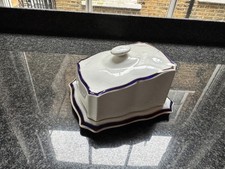 Antique covered cheese dish with blue and gold band