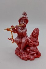 Red Statue Of Radha And
