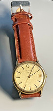 Timex Q Quartz Gold Dial Watch