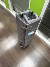 Cuggl travel cot with wheels