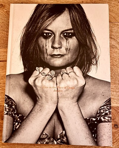 Alive the face death - of, by
