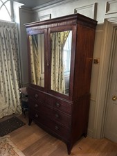 George Third gentleman's mahogany wardrobe with mirrored doors