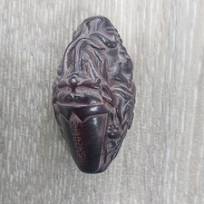 CARVED NETSUKE WITH CHARACTER MARKS/SCRIPT.