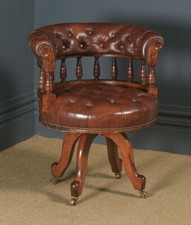 Antique English Victorian Oak and Brown Leather Revolving Captain's Chair