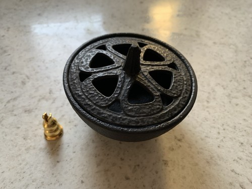 Cast iron incense - a, holder
