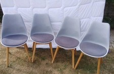 4 X Grey Dinning Room Chairs With Wooden Legs And Padded Seat.