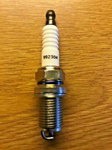 Briggs and stratton spark plug - and,