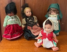 4 Vintage Souvenir Dolls