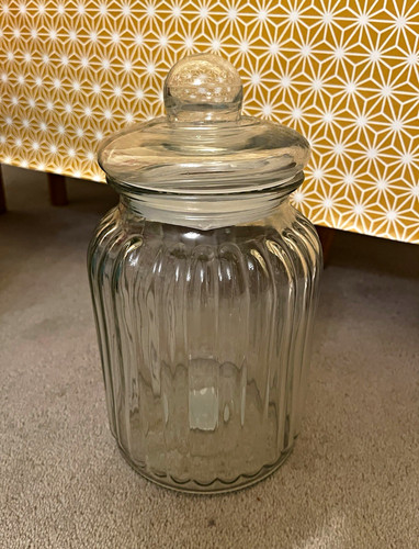 Fluted glass storage jar with - fluted,