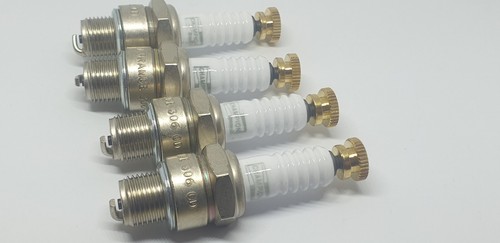 Champion spark plugs - spark,
