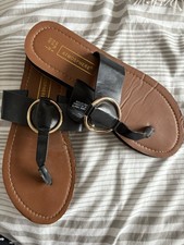 Toe Post Sandals By Atmosphere Size 5. Black strap With Gold Coloured Buckle