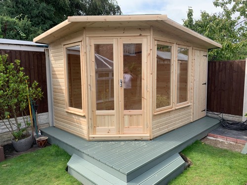 Corner summerhouse shed - &,