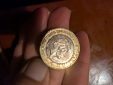 Two Coins One Old One Penny