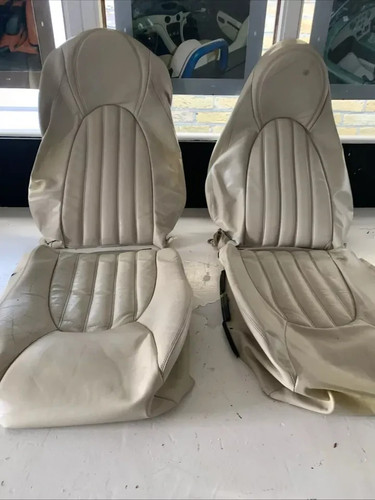 Front seat leather covers - ,