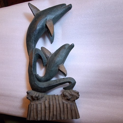 Wooden carved dolphin figurine