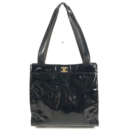 Chanel vintage punched logo - chanel,
