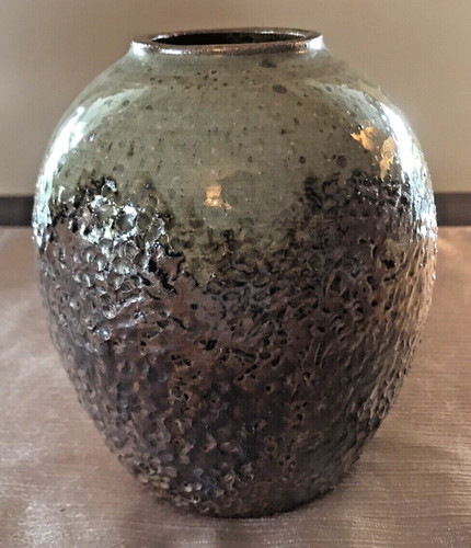 Hand thrown art - hand, vase