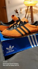 Adidas 'ZURRO' Black and Orange Trainers .Size 9.5UK