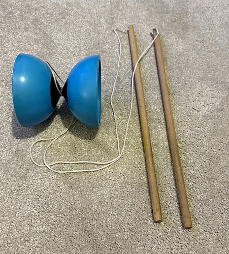 Blue diabolo juggling - juggling, with