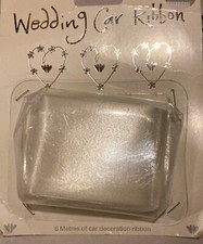 White wedding car ribbon