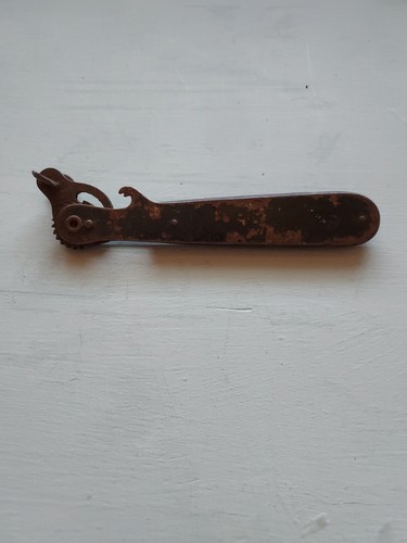 Vintage can opener - can,
