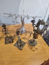 Selection Of Metal Ornaments Including Silver Plane And Nuts And Bolts Figures