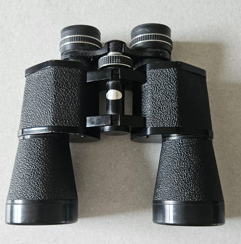 Binoculars solus by - -,