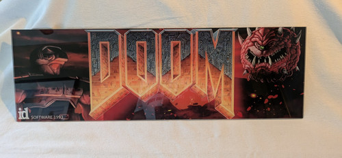 Doom arcade marquee - doom, (i.d.)