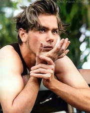 River Phoenix Posing with Hand