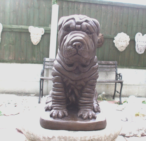 Sitting bronze concrete puppy - sitting,