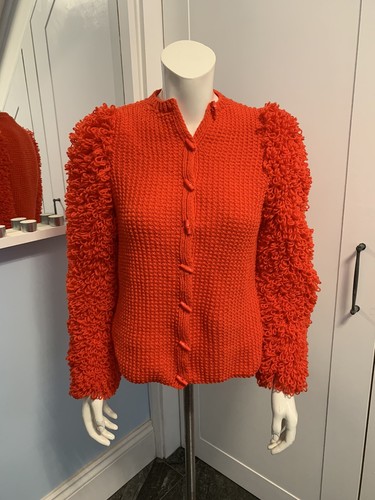 Hand knitted red loopy sleeved - hand,