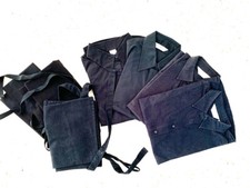 4 x Black catering shirts and 3 x aprons: bar staff, BBQ, waiting staff, chef