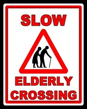 SLOW ELDERLY CROSSING THE ROAD