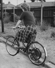 An Unspecified Woman Riding A