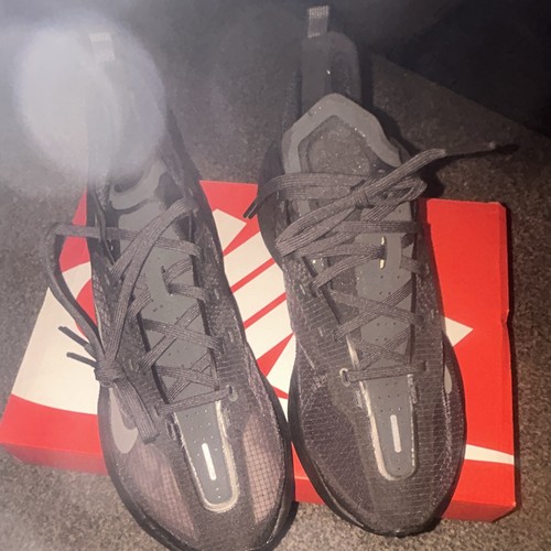 Nike black low - top, lace-up