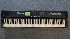 StudioLogic SL-880 MIDI master keyboard controller with wood-weighted keys