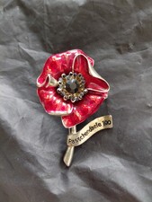 Poppies brooch with sparkle stones on gold coloured stem