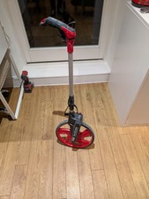 measuring wheel, also known as a surveyor's wheel or distance measuring wheel.