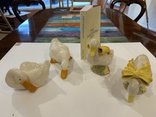 Four china duck figurines - four,